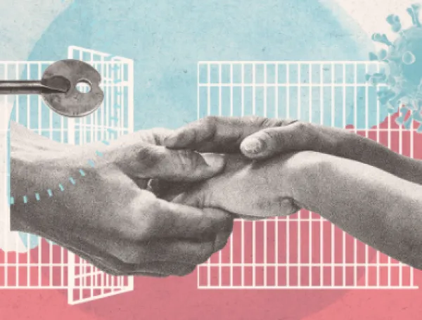 Two hands holding each other