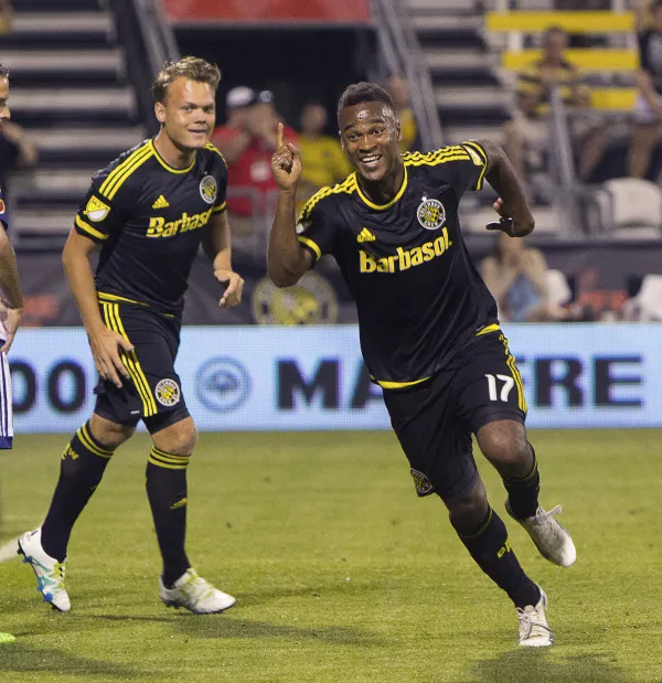 Two guys playing soccer