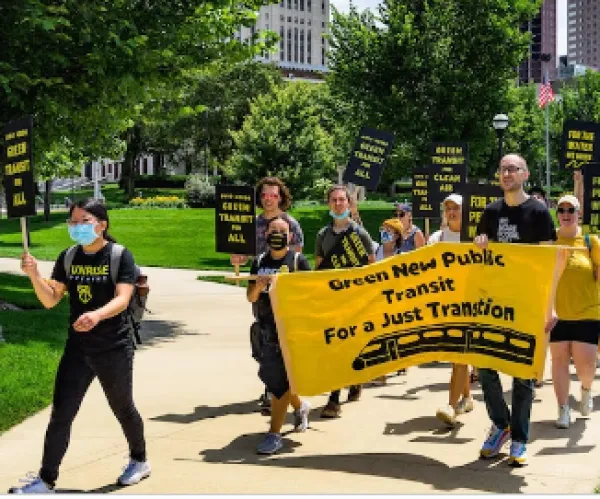 People marching for mass transit