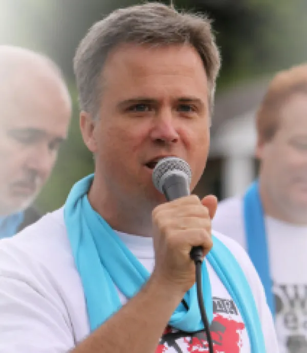 David talking into a mic