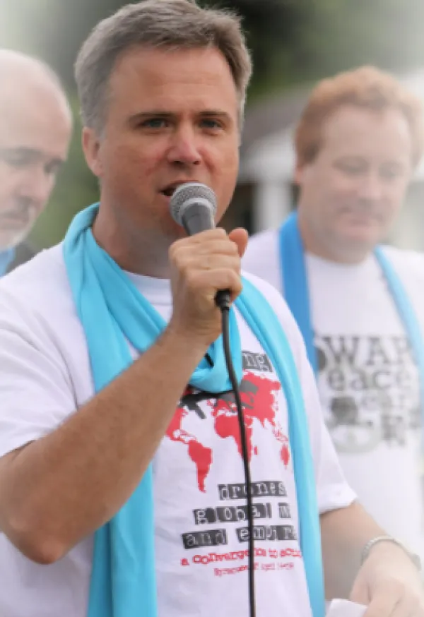 Man talking into a mic