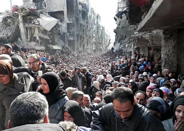 Bombed building and Syrian people fleeing