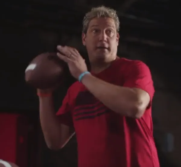 Tim Ryan throwing football