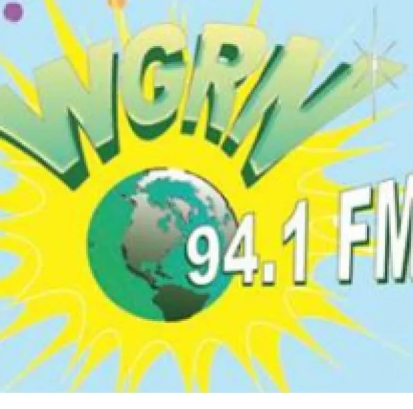 Letters WGRN and 94.1FM with a earth and a yellow splash behind it over light blue