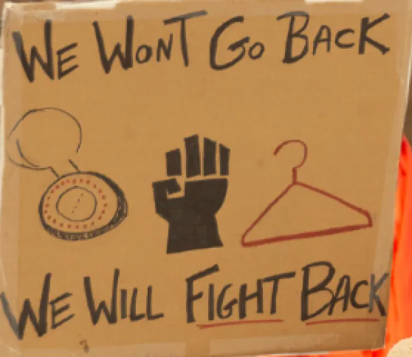 Sign saying we won't go back