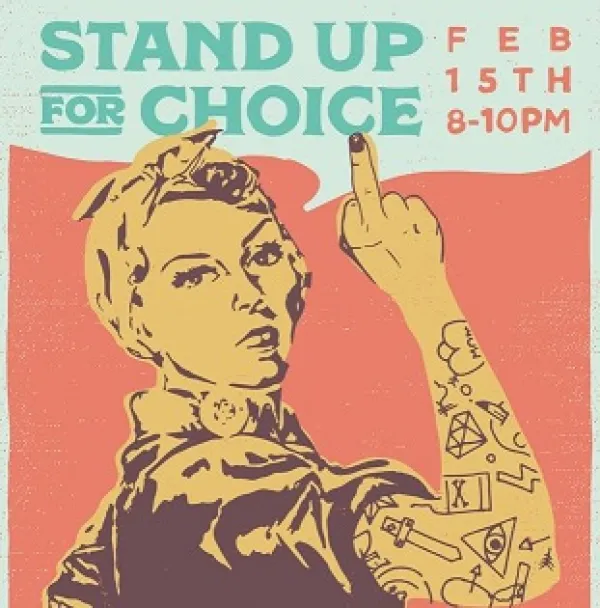 Woman giving finger to Trump