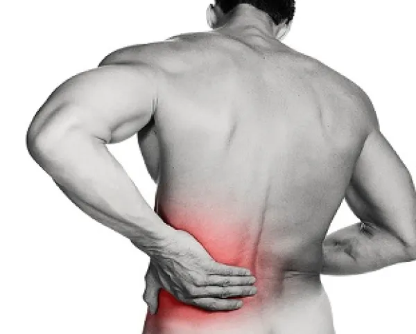 Naked man's back with red glow at the bottom and him holding it as if in pain