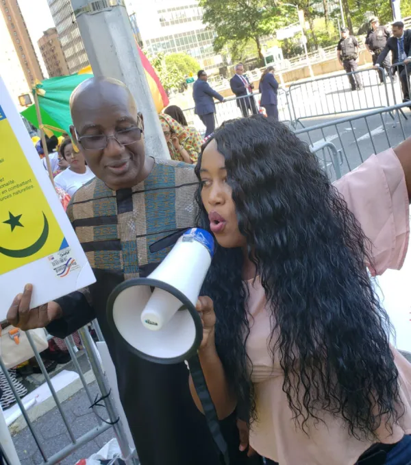 Woman speaking into a megaphone