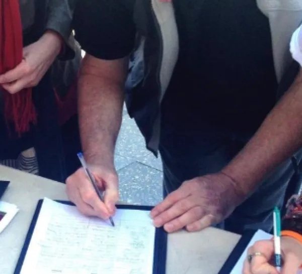 People signing petitions