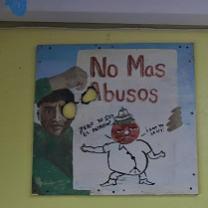 A poster of a drawing of a man and the words No Mas Abusos
