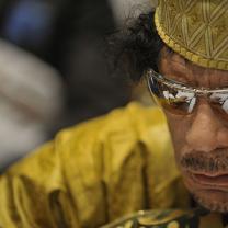 Close up of Qaddafi in sunglasses