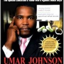 Book cover with black man in suit with pink tie looking ahead with hand by side of head as if thinking and some white pills to the right and the name Umar Johnson in red letters below
