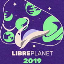 Purple background and drawings of lots of stars and planets and the words Libreplanet 2019