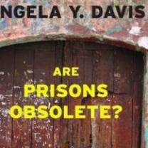 A wooden door and the words Angela Y. Davis and Are Prisons Obsolete?