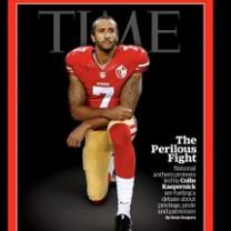 Magazine cover with word TIME at the top and football player in red and gold jersey kneeling and facing the camera and words about him - Colin Kapernick