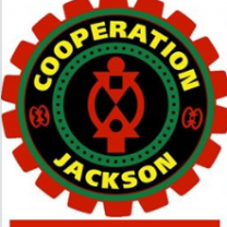 Round circle with little tabs all around in orange the words Cooperation Jackson inside