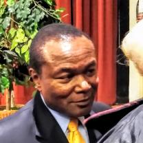 Black man deep in conversation