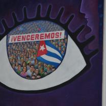 Big eye poster with words "Venceremos"