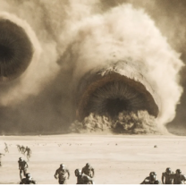 Clouds of dust kicked up at people from what looks like huge cannons