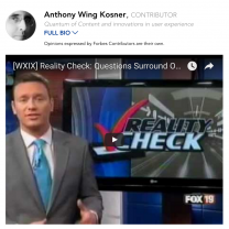 Screenshot of white male newscaster next to a screen with the words Reality Check with a big red checkmark