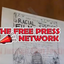 Newspaper saying Racial Justice and the words Free Press Network on top in red with a red bullhorn