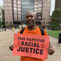 Man holding sign 
