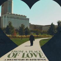 A heart with a man walking on a path and title of movie