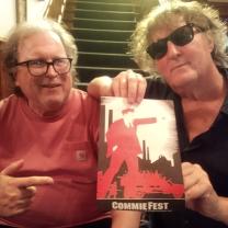 Bob and Dan showing a Comfest flyer