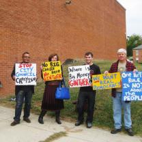 Protesters outside the October 1 public meeting asked: Where is Andrew Ginther?