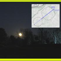 A full moon at night and a map