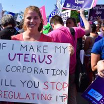 Woman holding a pro-choice sign