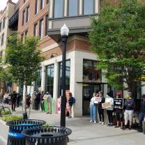 People protesting outside a building