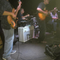 Guys playing instruments