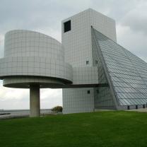 Big concrete structure with roundedness to the buildings and one big triangular side