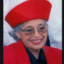 Older woman in red hat