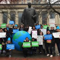 SDD demonstrators next to the Columbus statue at City Hall