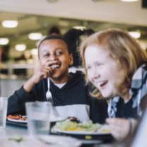 Children at table eating lunch