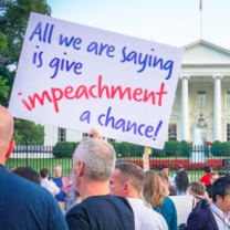 Sign saying All we are saying is give impeachment a chance