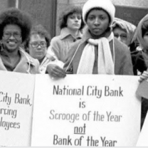 Women holding signs