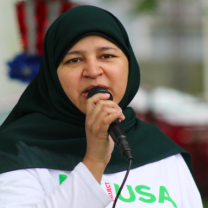 Woman talking into mic