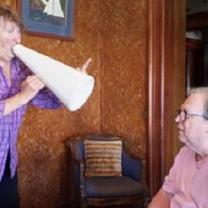 Dan Dougan yelling at Bob through a megaphone