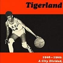 Top part of book cover with a guy playing basketball and the word Tigerland