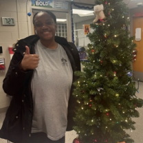 Woman by a Xmas tree