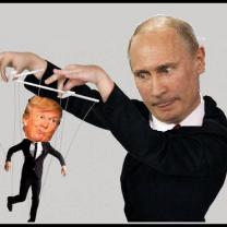 Putin, balding white guy wearing black holding puppet strings with Trump as the puppet