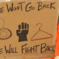 Sign saying we won't go back