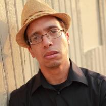 Black man in a hat