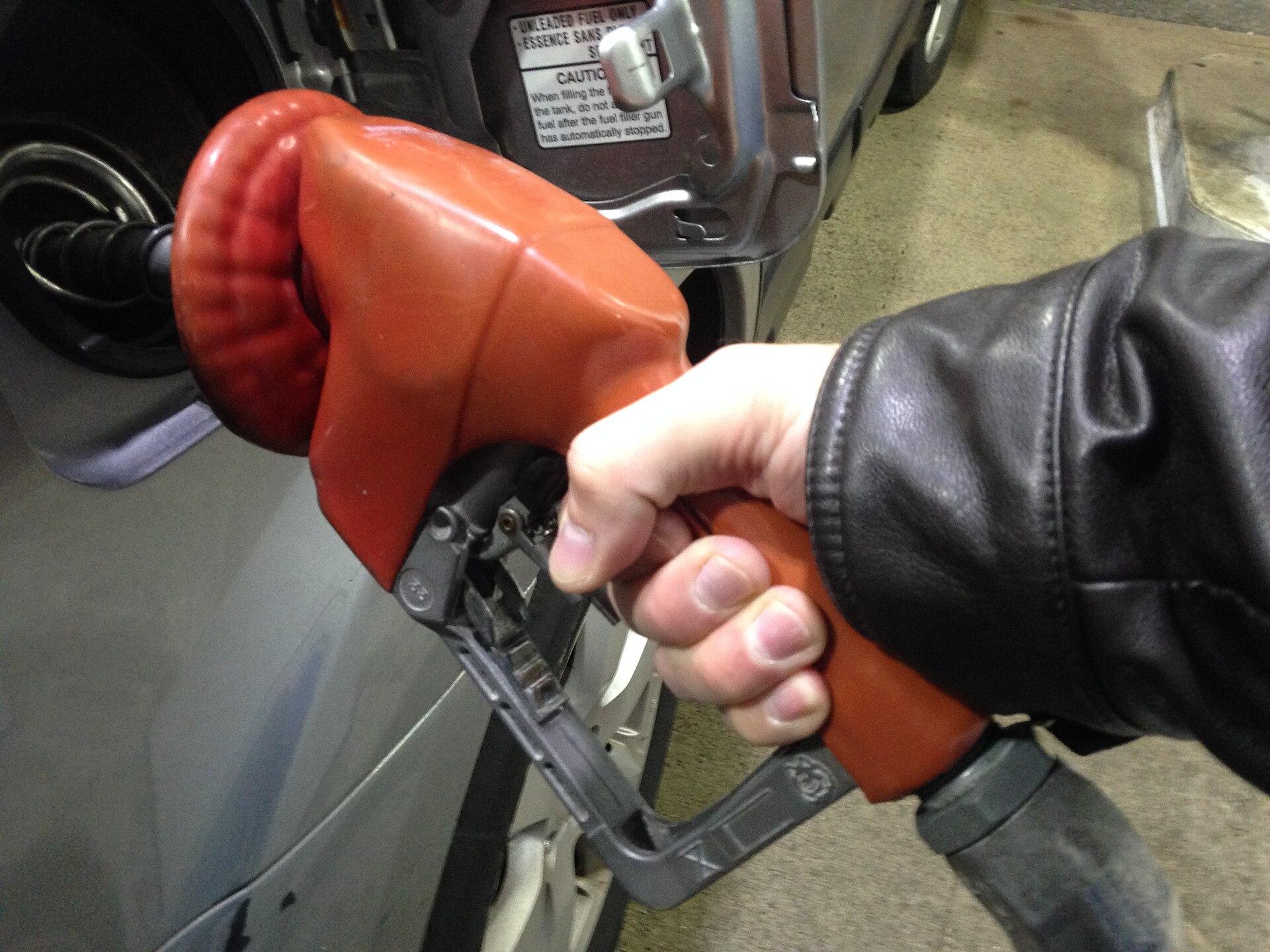 Person pumping gas