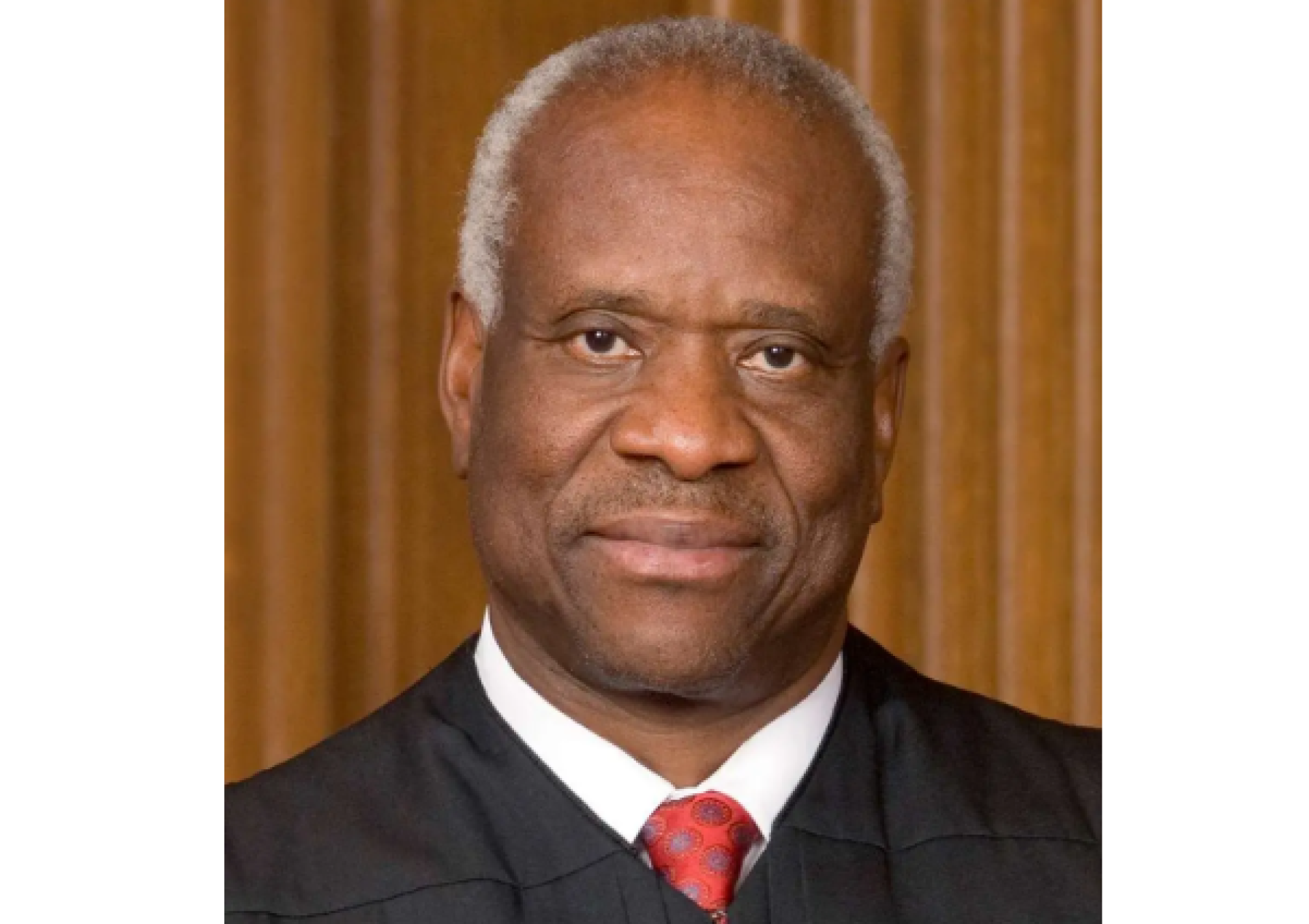 Black man in a Supreme Court robe