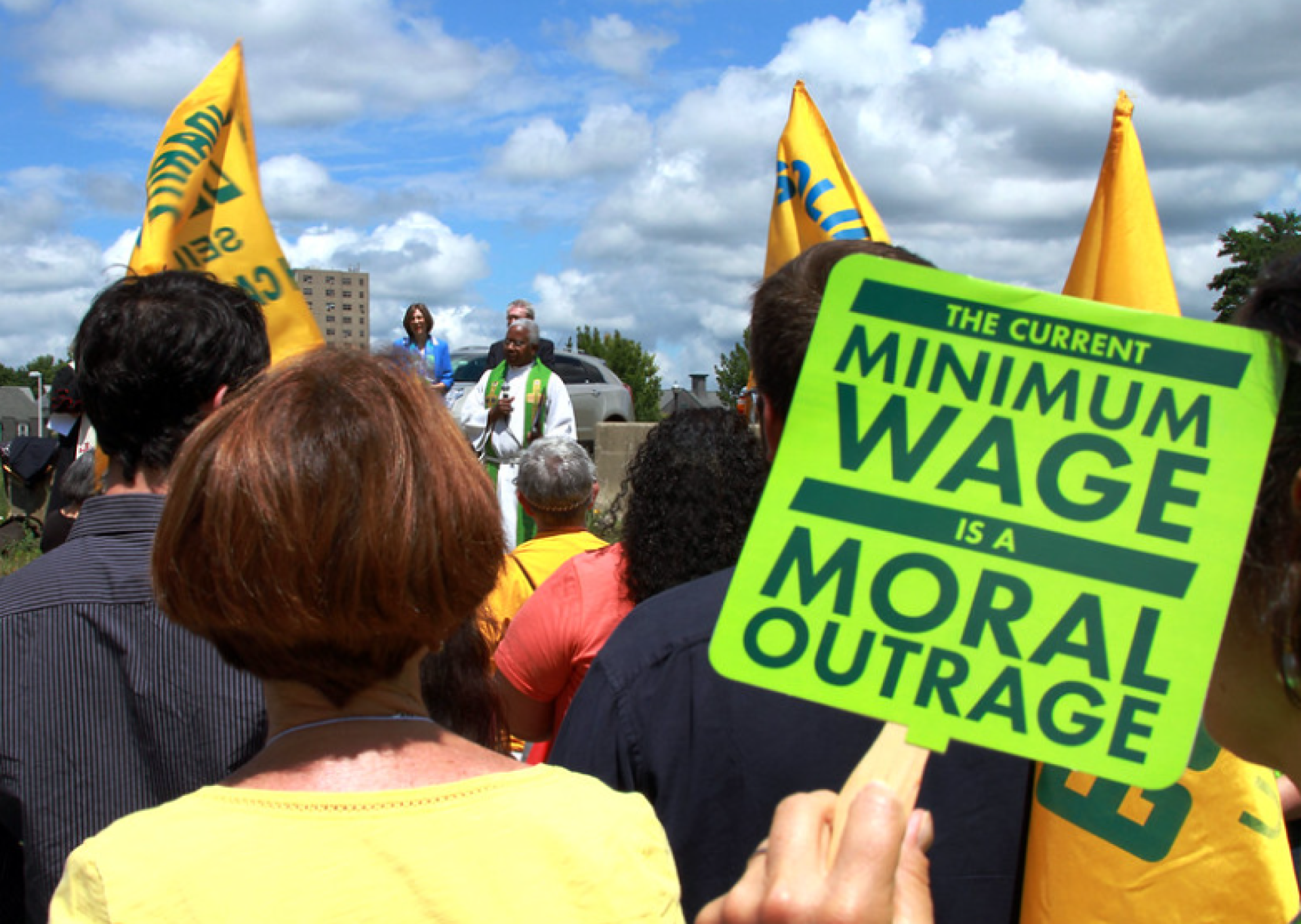 Sign saying Minimum Wage is a Moral Outrage