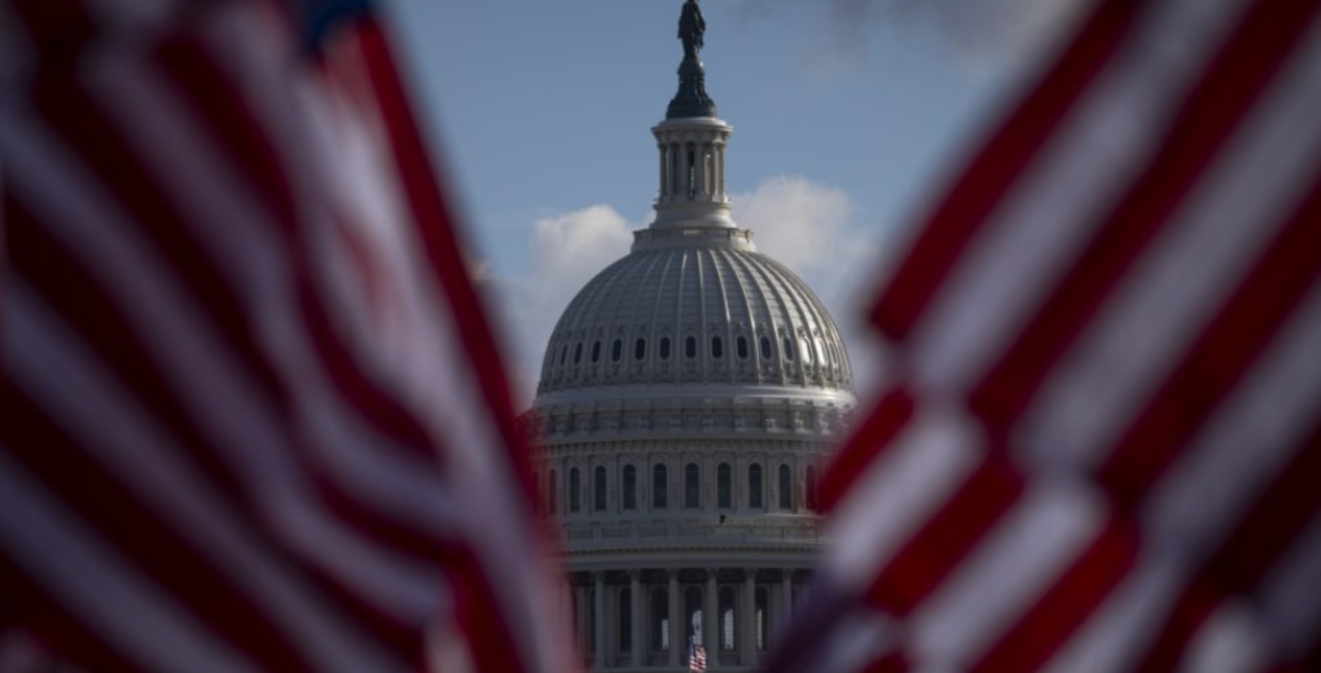 Building sourrounded by US flags